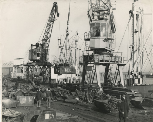 Photograph showing loading scrap metal at Blyth Harbour